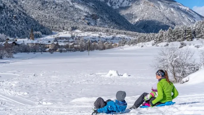 Luge vacances d'hiver en famille - Alpesphotographi